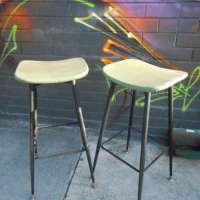 Pair matching bar  kitchen stools - FEATHERSTON designed, Aristoc manufactured - green vinyl upholstered with black metal legs - Sold for $43 - 2015