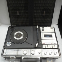 Sanyo portable stereo music centre with built in turntable and speakers - Sold for $37 - 2015