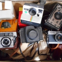 Box of camera gear incl  Polaroid Land camera, Viewers, Box Brownie junior etc - Sold for $43 - 2015