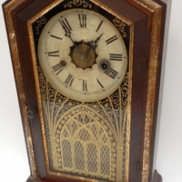 Victorian Gothic style clock by New Haven Clock Co  with twin key wind and 5 inch face - Sold for $220 - 2015
