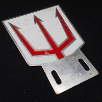 Contemporary aluminum NEPTUNE motor oil badge, approx 10cm H - Sold for $49 - 2015