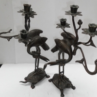 Pair of bronze candlesticks of figural cranes standing on turtles backs - Sold for $67 - 2015