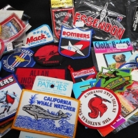 Small box lot - assorted vintage & contemporary sew on PATCHES incl, Essendon Bombers, Ford Mustang, BP, Mack Trucks, Allan Industries, Australian, In - Sold for $55 - 2015