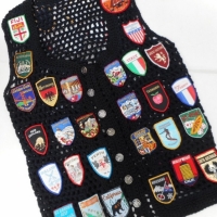 Vintage crochet travel vest with heaps of sewn on souvenir travel patches - Sold for $24 - 2015