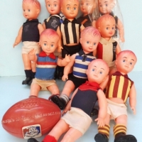 10 x 1960s VFL football player dolls in soft plastic with various team cotton team uniforms circa 1960s some with footballs - Sold for $464 - 2016