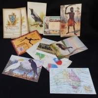 Group of Australiana postcards Incl Aboriginal with boomerangs, 1956 Olympics, Map, Native birds and Advance Australia - Sold for $34 - 2016