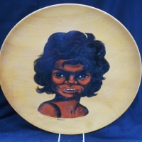 Large vintage wooden charger with hand-painted image of an Aboriginal youth - titled 'Wirrin - Sold for $49 - 2016
