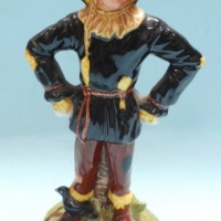 4 x Royal Doulton Ltd Edit  Wizard of Oz  figurines -  Dorothy, The Tinman, Lion & Scarecrow - Sold for $390 - 2016