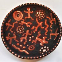 Carl Cooper Australian Pottery earthenware plate - Painted figures dots and snakes - Signed to base Carl Cooper Australia - 11cm D - Sold for $224 - 2019
