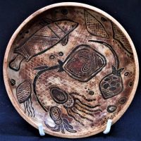 Carl Cooper Australian Pottery earthenware plate with Sgraffito Sting Ray and jellyfish decoration Marked to base Carl Cooper 1947 - 14cm diameter - Sold for $298 - 2019