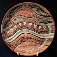 Carl Cooper Australian Pottery earthenware plate with painted Lizard decoration - marked to base Carl Cooper 1948 Australia - 19cm D - Sold for $596 - 2019
