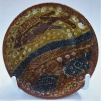 Carl Cooper Australian pottery dish with painted and sgraffito Aboriginal motifs of Turtle and fish - approx 95cm diam signed to base - Sold for $149 - 2019