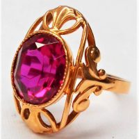 Ladies 14ct rose gold dress ring set with approx 5 ct Shocking pink oval cut Ruby - TW 5 4 grms - marked 583 with Russian markings - Sold for $373 - 2019