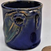 Remued Australian pottery miniature vase with applied gum leaf -  blue glaze - 5cm H - Sold for $149 - 2019