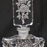 Vintage Czech cut crystal perfume bottle with tall floral engraved stopper - Sold for $37 - 2019